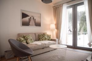 Istumisnurk majutusasutuses Apartmán Jestřáb 5