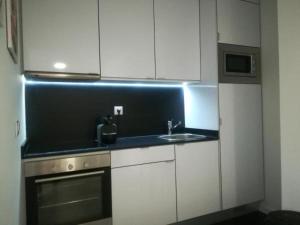 Een keuken of kitchenette bij Irís Apartment