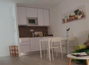 Een keuken of kitchenette bij Irís Apartment