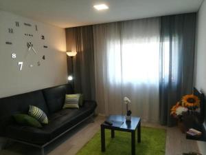 Een zitgedeelte bij Irís Apartment