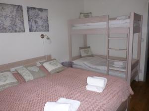 Voodi või voodid majutusasutuse Apartmán Jestřáb 5 toas