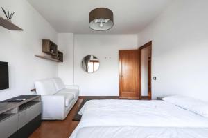 A bed or beds in a room at Appartamento di design