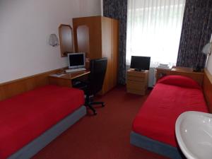Postel nebo postele na pokoji v ubytování Miles Hotel Berlin