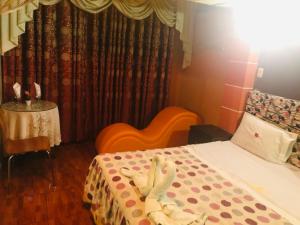 Postel nebo postele na pokoji v ubytování Hotel Manantial No,001