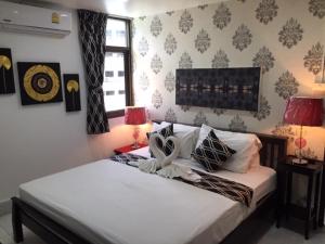 Letto o letti in una camera di Fong Kaew and Baan Nang Fa Guesthouse