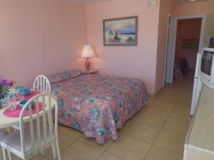 Postel nebo postele na pokoji v ubytování Caprice Motel - Wildwood