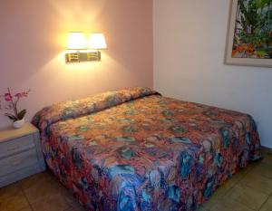 Postel nebo postele na pokoji v ubytování Caprice Motel - Wildwood