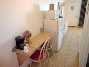 Kuchyň nebo kuchyňský kout v ubytování Caprice Motel - Wildwood