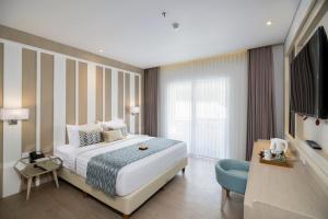 Postel nebo postele na pokoji v ubytování Grand Mirage Resort & Thalasso Bali - All Inclusive