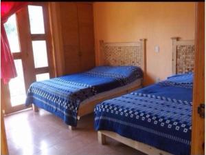 Letto o letti in una camera di Cabaña "La Matera"