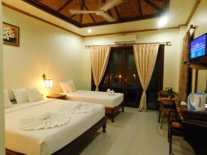 Cama o camas de una habitación en Sengahloune Villa