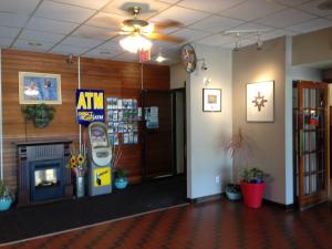 a lobby with an atm machine in a room at Moby Dick Inn in Prince Rupert