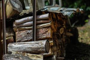 a pile of logs stacked on top of each other at Tomah Retreat - Studio RELAX with fireplace in Mount Tomah