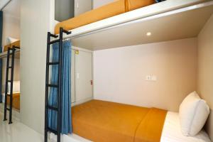 Postel nebo postele na pokoji v ubytování Taste of Bali Hostel