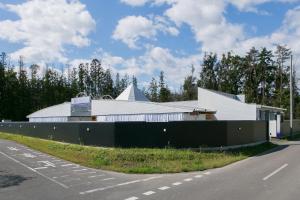 a white building on the side of a road at HOTEL LYISTA (Adult Only) in Hanamaki