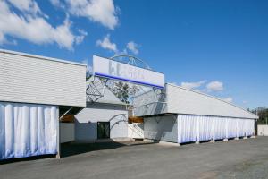 a building with a sign that reads music at HOTEL LYISTA (Adult Only) in Hanamaki