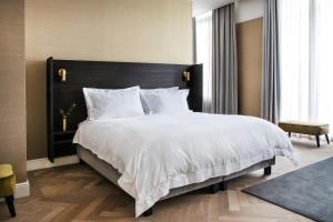 
Een bed of bedden in een kamer bij Pillows Grand Boutique Hotel Reylof Ghent
