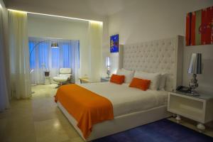 Voodi või voodid majutusasutuse Trident Hotel toas