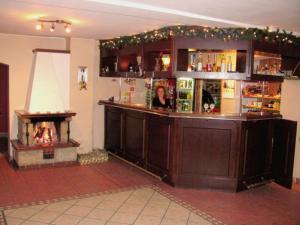 Lounge nebo bar v ubytování Gościniec ELLA INN Lipniki