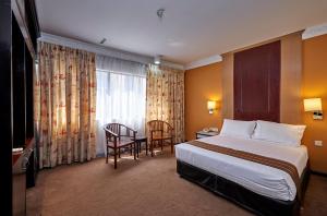 Ένα ή περισσότερα κρεβάτια σε δωμάτιο στο Palace Hotel +55 φωτογραφίες