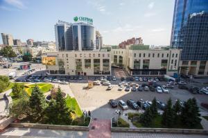 an aerial view of a parking lot in a city at AZIMUT Hotel Siberia in Novosibirsk