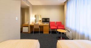 TV a/nebo společenská místnost v ubytování Hotel Landmark Wakayama
