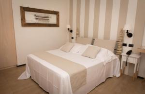 Postelja oz. postelje v sobi nastanitve Hotel Borgo Pantano