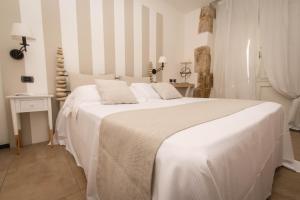 Postelja oz. postelje v sobi nastanitve Hotel Borgo Pantano