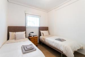 Cama o camas de una habitación en Apartamento Max