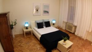 Posteľ alebo postele v izbe v ubytovaní Opera Dream Apartment