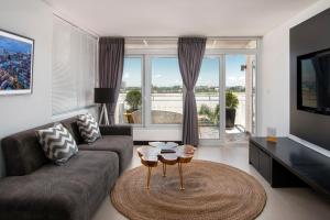 Posezení v ubytování TAO Riverside Residence