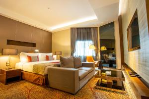 Postel nebo postele na pokoji v ubytování Graceland Bangkok by Grace Hotel - SHA Extra Plus