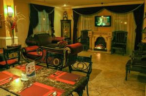 Posezení v ubytování Al Maha Regency Hotel Suites - Managed by Aoudi Consultants