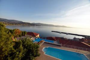 a view of a large body of water with houses at Molyvos Manor in Mythimna