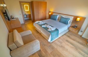 Postel nebo postele na pokoji v ubytování Dalyan Live Spa Hotel