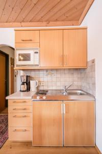 Kuchyň nebo kuchyňský kout v ubytování Haus am Platz - Weitgasser