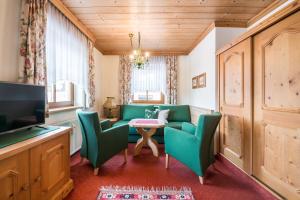 TV a/nebo společenská místnost v ubytování Haus am Platz - Weitgasser