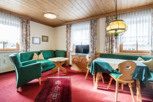 TV a/nebo společenská místnost v ubytování Haus am Platz - Weitgasser