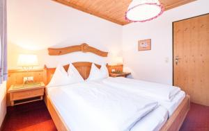 Postel nebo postele na pokoji v ubytování Haus am Platz - Weitgasser