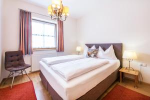 Postel nebo postele na pokoji v ubytování Haus am Platz - Weitgasser