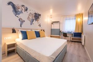 Una cama o camas en una habitación de Tulip Inn Antwerpen