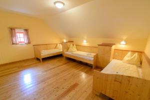 Postel nebo postele na pokoji v ubytování JUFA Hotel Donnersbachwald + 22 fotografií