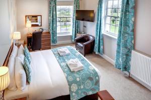 Katil atau katil-katil dalam bilik di Lord Haldon Country Hotel, Sure Hotel Collection by Best Western +115 gambar