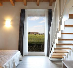 Posteľ alebo postele v izbe v ubytovaní Agriturismo Corte Foscara