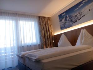 Łóżko lub łóżka w pokoju w obiekcie Hotel Wagner