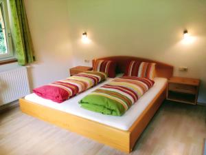 Łóżko lub łóżka w pokoju w obiekcie Apartment Santnerhof