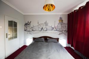 Łóżko lub łóżka w pokoju w obiekcie Apartamenty Ogrodowa - Lublin 700