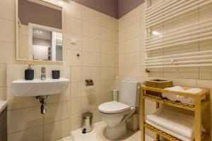 Kúpeľňa v ubytovaní Okrzei 18 - studio by Homeprime + 26 fotografií