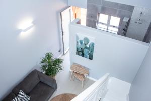Postel nebo postele na pokoji v ubytování Lofts on Lorna