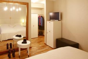 Krevet ili kreveti u jedinici u okviru objekta Hotel des Balances